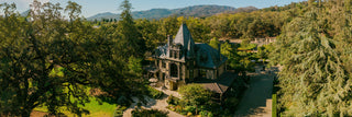 Beringer winery rhine house surrounded by trees and greenery